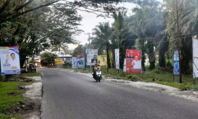 fokus_lensa_perang_baliho_di_simalungun