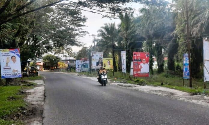 fokus_lensa_perang_baliho_di_simalungun