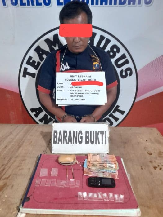 pria_47_tahun_di_labuhanbatu_ditangkap_polisi_dompet_berisi_sabu_ditemukan_di_tunggul_sawit
