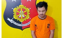 polsek_kualuh_hulu_tangkap_buronan_kasus_pencurian_babi_di_aek_kanopan_