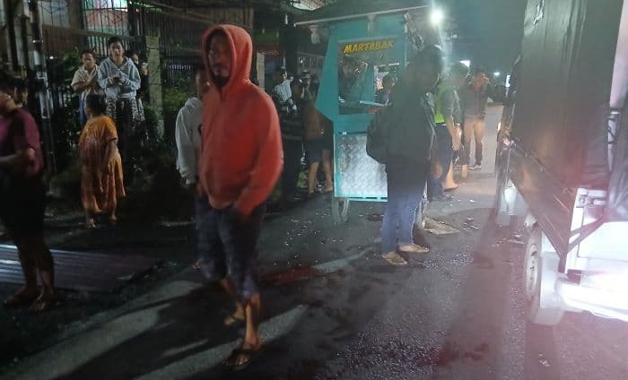 ngebut_di_jalan_ade_irma_siantar_pemotor_tewas_tabrak_gerobak_martabak