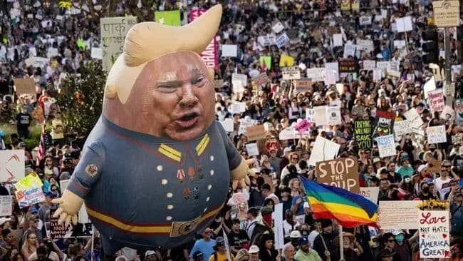 kebijakan_trump_memicu_protes_massal_di_puluhan_kota_amerika_serikat