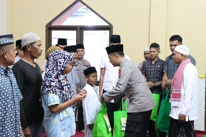 polres_tapteng_gelar_buka_puasa_bersama_dan_beri_bansos_tagline_polisibaik