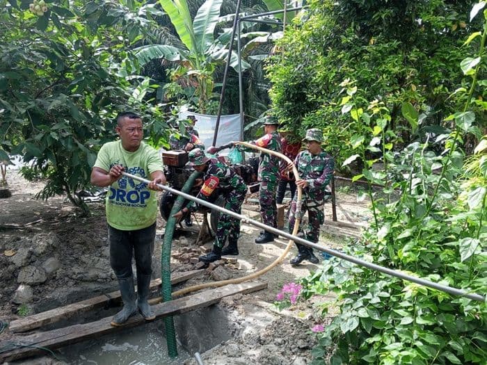 tmmd_ke124_kodim_0208asahan_bangun_sumur_bor_untuk_akses_air_bersih_warga