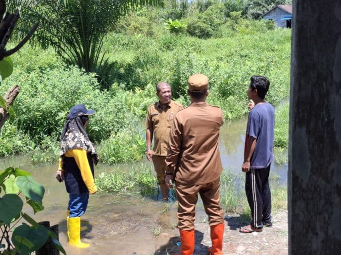 pemko_tanjung_balai_antisipasi_banjir_di_titi_payung_bandar_jepang