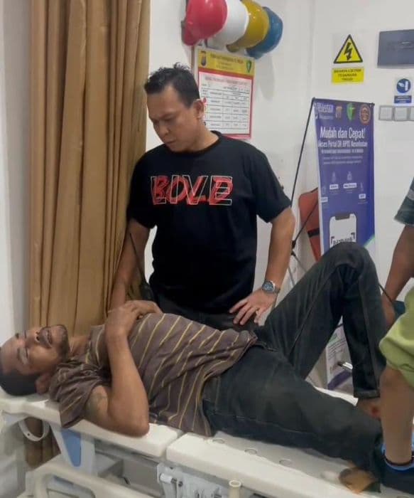 polisi_tembak_buronan_pembongkar_gudang_cat_di_medan