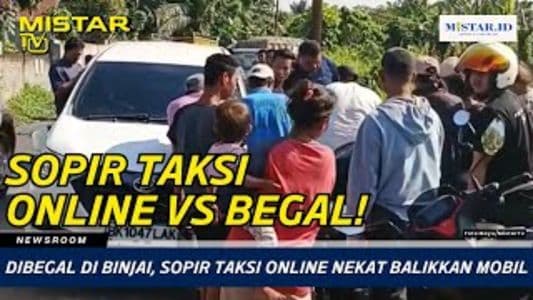 newsroom_dibegal_di_binjai_sopir_taksi_online_nekat_balikkan_mobil