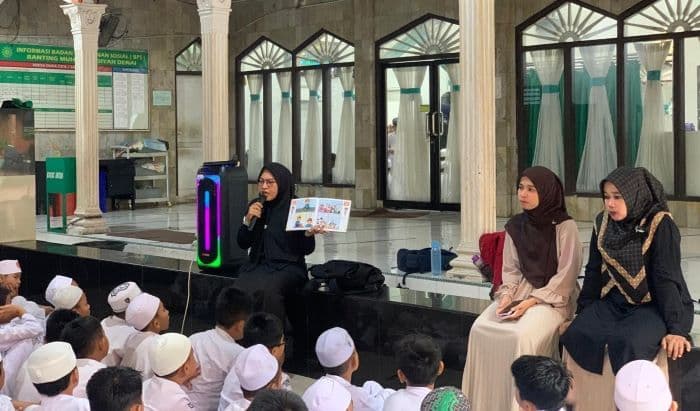 tanamkan_cinta_membaca_sejak_dini_sdt_muhammadiyah_36_medan_luncurkan_gerobak_baca_di_pekan_literasi