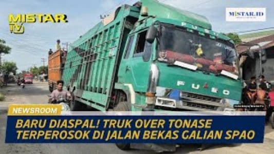 newsroom_baru_diaspal_truk_over_tonase_terperosok_di_jalan_bekas_galian_spao