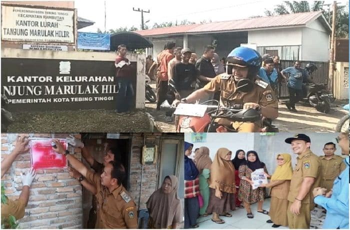 naik_motor_wali_kota_tebing_tinggi_serahkan_beras_mahdani_langsung_ke_warga