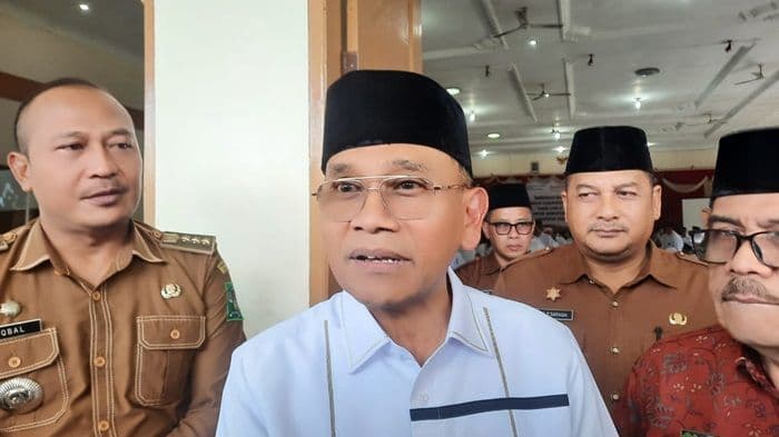 bupati_janji_perbaiki_irigasi_rusak_di_hutabayu_raja_dan_tangani_banjir_di_serbelawan