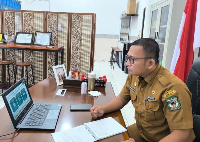 usai_dicopot_dari_jabatannya_pardomuan_dimutasi_ke_dinas_pariwisata_siantar