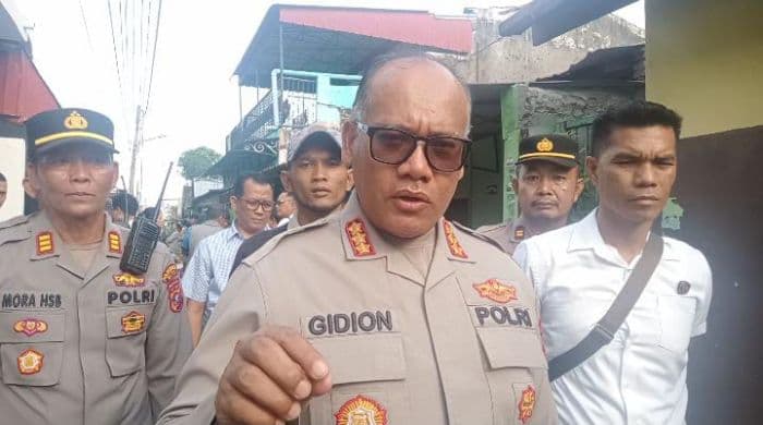 polisi_selidiki_temuan_mobil_dengan_jasad_pria_yang_ditemukan_di_kutalimbaru