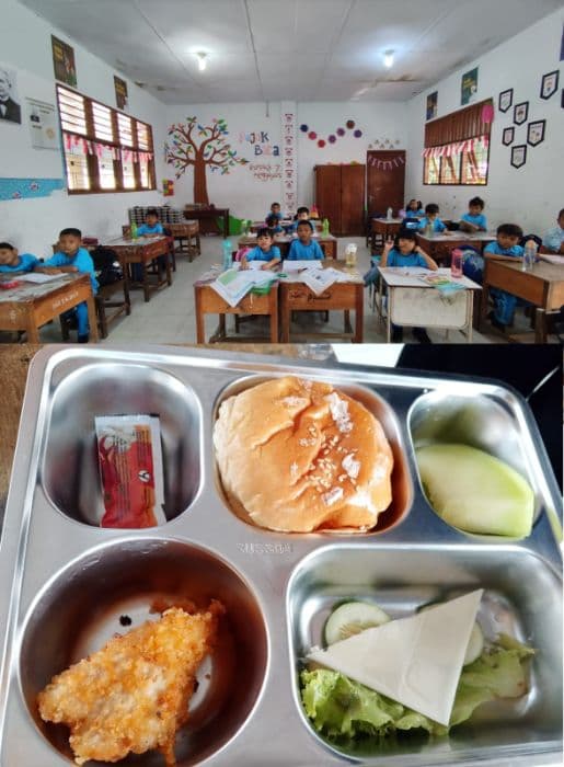 program_mbg_di_pematangsiantar_sppg_aek_nauli_bagikan_menu_burger_dan_sayur_ke_siswa_sd