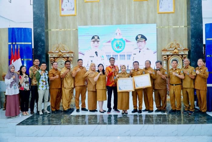 pemkab_labuhanbatu_terima_penghargaan_penyaluran_dana_desa_dan_dak_fisik_tercepat