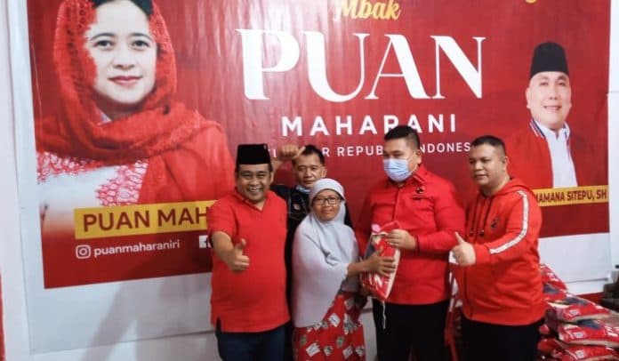 20_ton_beras_premium_bergambar_puan_maharani_dibagikan_di_asahan