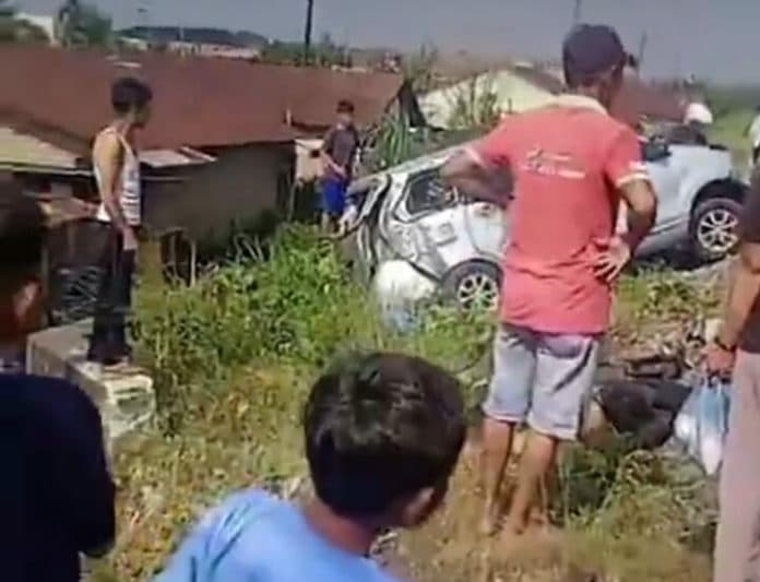 akibat_kecelakaan_antara_mobil_dan_ka_di_sunggal_satu_orang_tewas