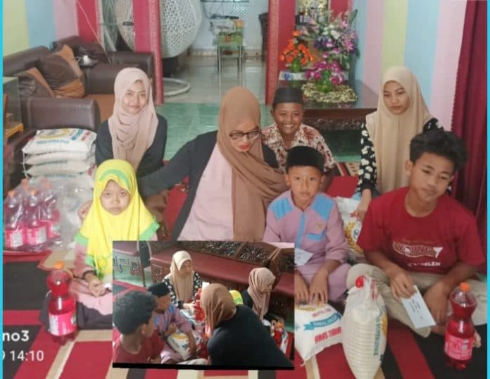 alumni_phbi_sma_negeri_2_siantar_angkatan_97_berbagi_dengan_anak_yatim