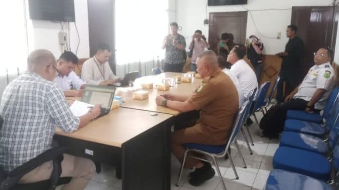 analisa_perwal_kota_medan_ombudsman_parkir_berlangganan_hanya_atur_di_tepi_jalan