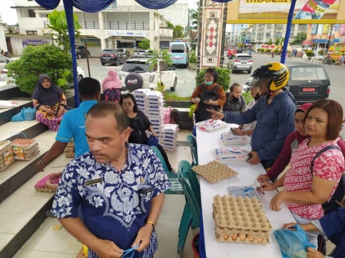 animo_masyarakat_tinggi_pemko_siantar_perbanyak_jumlah_beras_di_pasar_murah