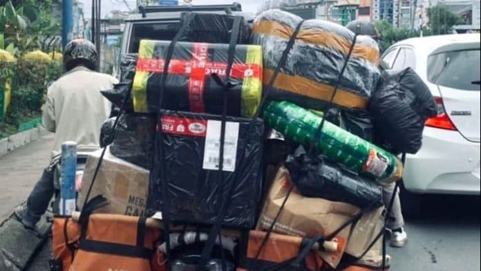 antar_seratusan_paket_sehari_kurir_ekspedisi_ini_tetap_berupaya_beri_tren_positif_ke_konsumen