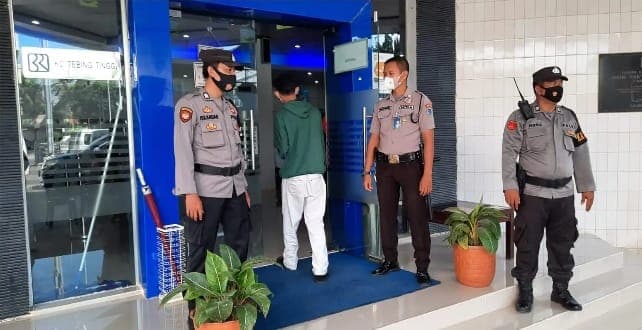 antisipasi_aksi_kriminalitas_petugas_kepolisian_patroli_di_kawasan_pintu_tol_tebing_tinggi