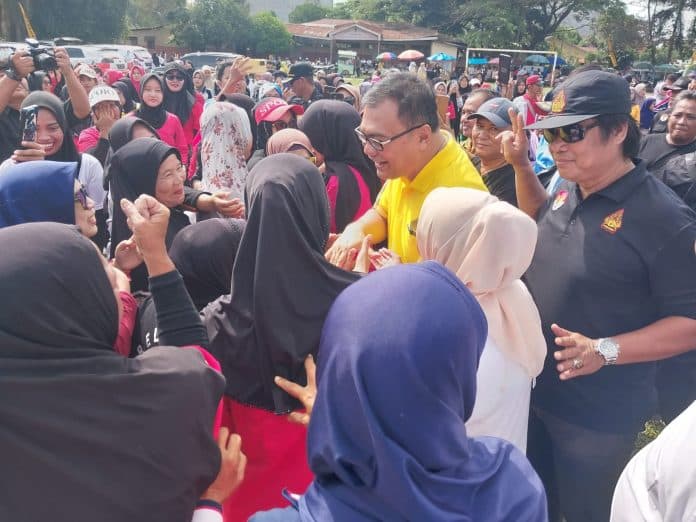 asri_ludin_tambunan_warga_deliserdang_yang_ingin_berobat_gratis_cukup_pakai_cap_jempol