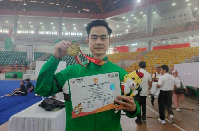atlet_wushu_sumut_nicholas_persembahkan_medali_emas_buat_keluarga_tercinta