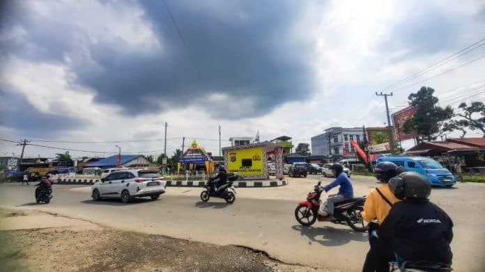 awal_tahun_2025_lalu_lintas_di_simpang_dua_siantar_tertib_dan_kondusif