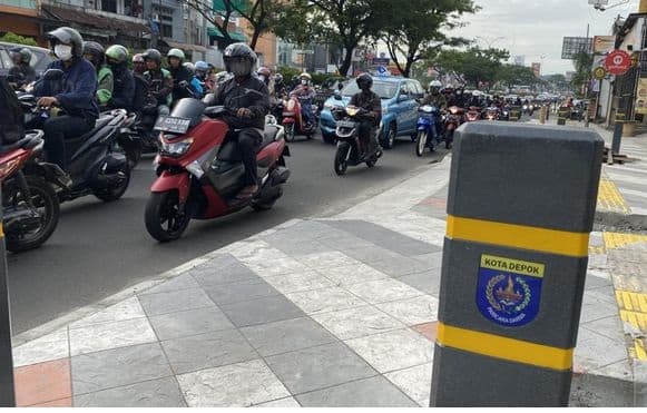 awas_lampu_motor_mati_di_siang_hari_tilang_etle_kenakan_denda_rp100_ribu_atau_kurungan_15_hari
