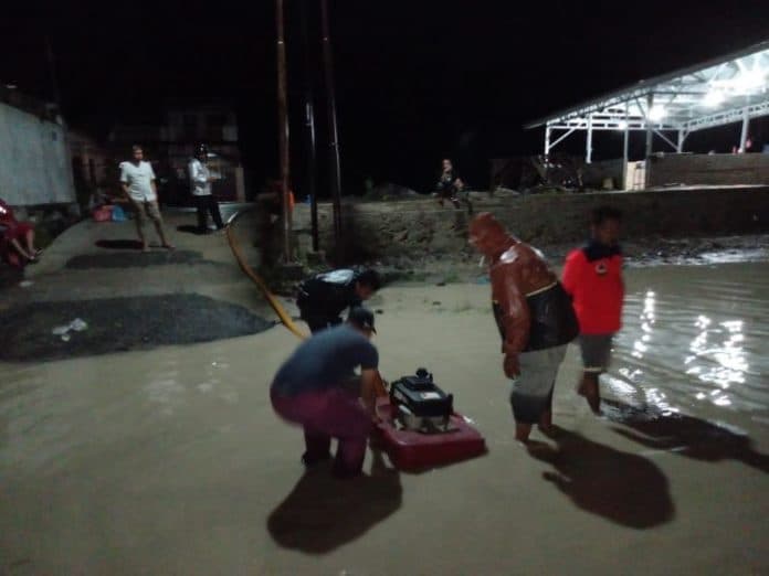 banjir_di_handayani_tak_kunjung_teratasi_bpbd_siantar_sibuk_kuras_air_saat_hujan