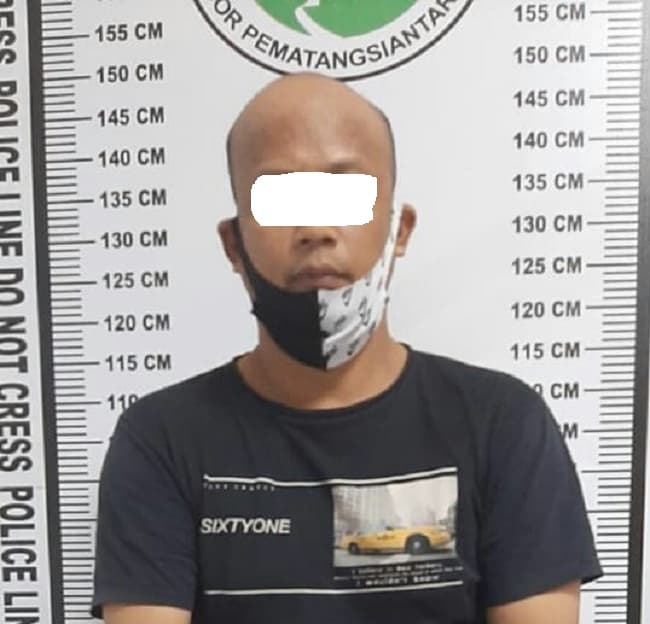 bawa_narkoba_ke_pasar_horas_pria_berkepala_plontos_diringkus_polisi