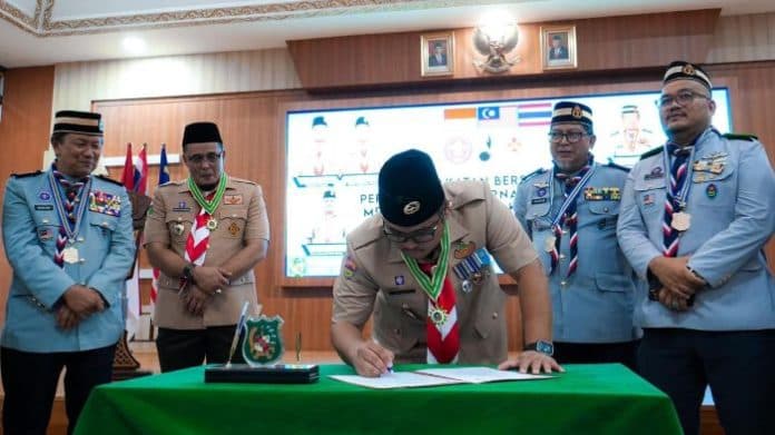 bentuk_generasi_unggul_kwarcab_pramuka_medan_jalin_kerja_sama_dengan_malaysia_dan_thailand
