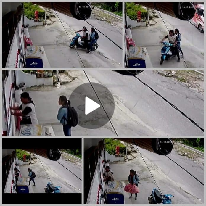 beraksi_di_kota_wisata_parapat_maling_di_siang_bolong_terekam_cctv