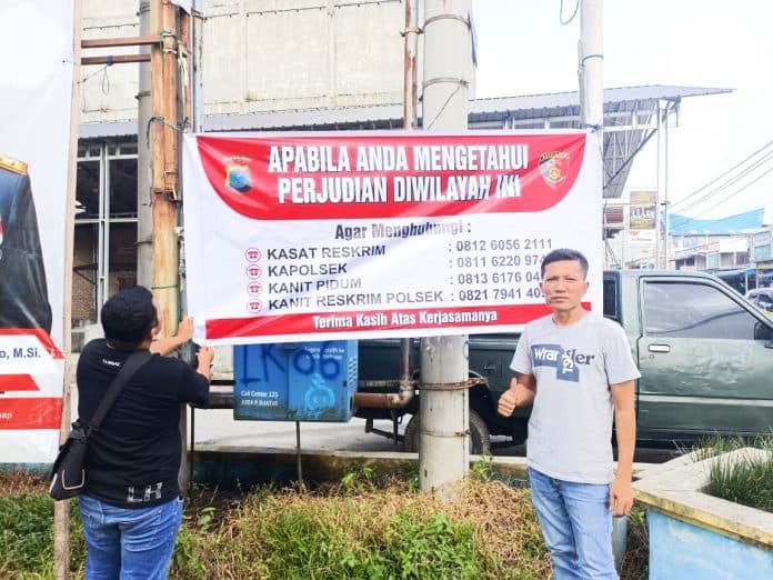 berantas_perjudian_sat_reskrim_polres_batu_bara_pasang_spanduk_nomor_pengaduan