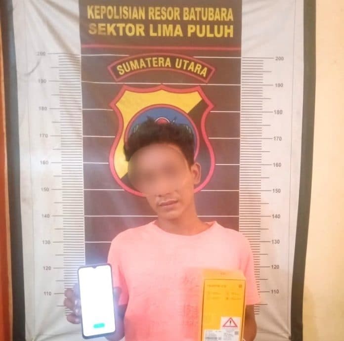bongkar_rumah_dan_curi_handphone_pelaku_diringkus_polsek_lima_puluh_saat_tidur