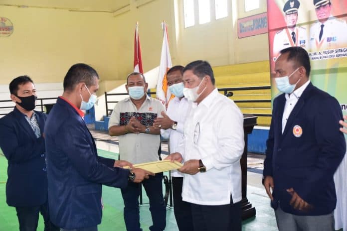 buka_rapat_anggota_koni_tahun_2021wabup_deli_serdang_olahraga_kebutuhan_pokok_pembangunan_jasmani_dan_rohani