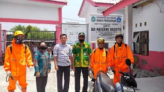 camat_belawan_pimpin_penyemprotan_disenfektan