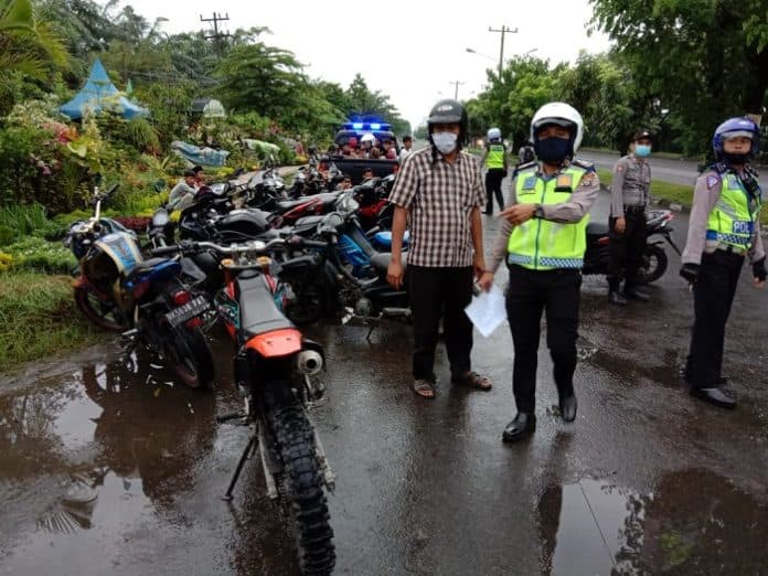 cegah_penyebaran_covid_19_polisi_amankan_37_orang_berikut_20_sepedamotor