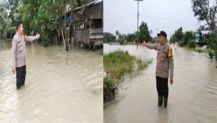 curah_hujan_tinggi_dan_tanggul_pecah_desa_paya_bagas_sergai_dilanda_banjir