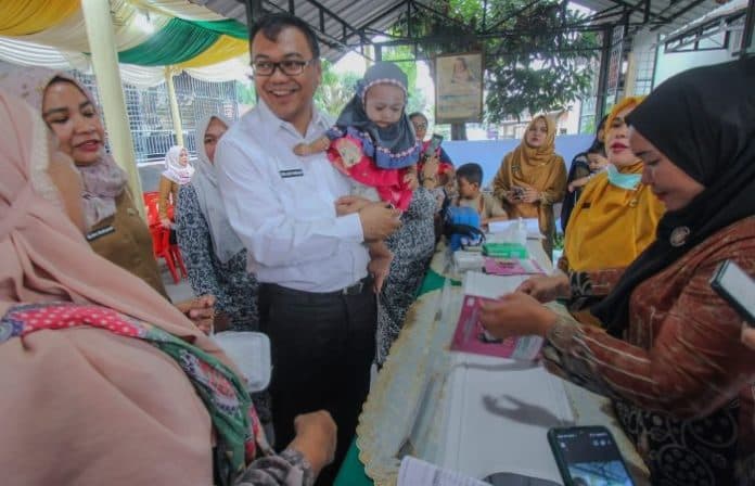 dalam_setahun_dinkes_deli_serdang_terbitkan_28_ribu_kis_bagi_warga_kurang_mampu