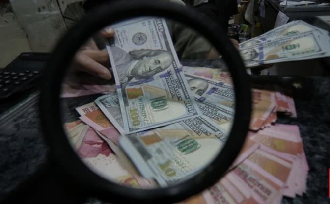 dampak_sentimen_inflasi_as_rupiah_menguat_di_level_rp15577_per_dolar