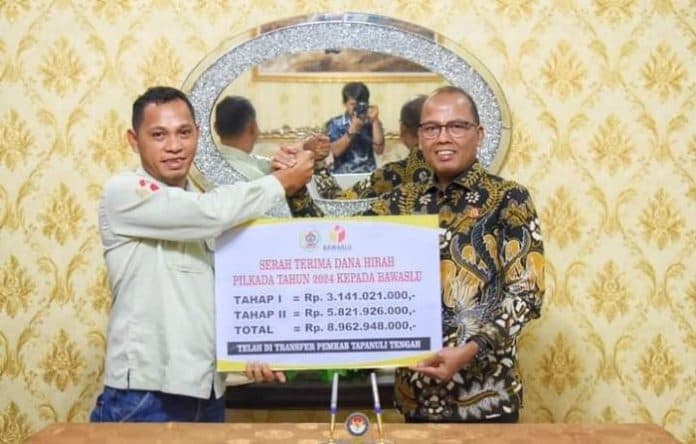 dana_hibah_pilkada_tapteng_sebesar_rp47_miliar_direalisasikan