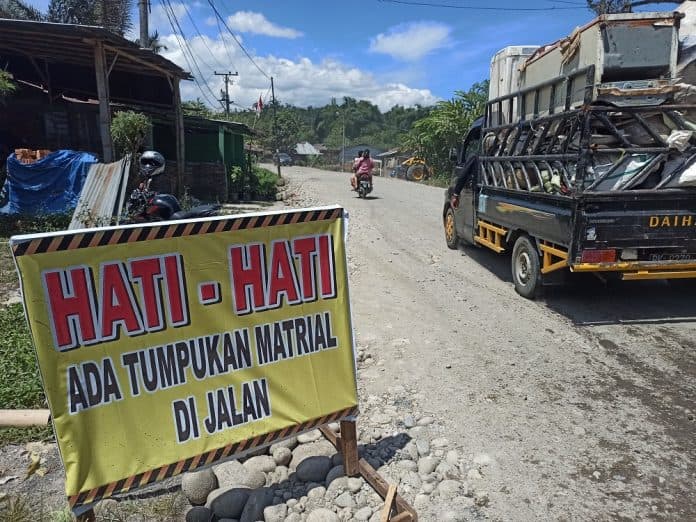 dana_perbaikan_jalan_saribudolok_rp12_miliar