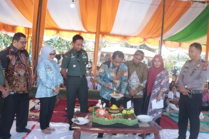 desa_mangga_dua_di_sergai_hut_ke_100_ini_pesan_bupati_darma_wijaya