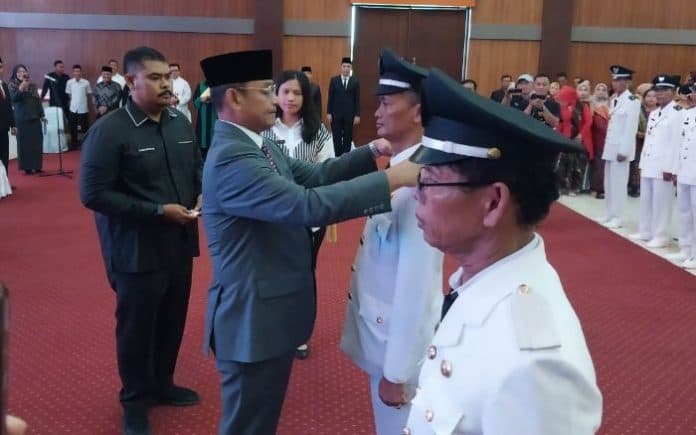 diberlakukan_masa_jabatan_8_tahun_73_kades_di_deli_serdang_dilantik_kembali