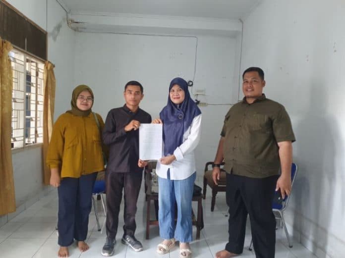 difasilitasi_bawaslu_medan_warga_dan_caleg_yang_berseteru_sepakat_berdamai