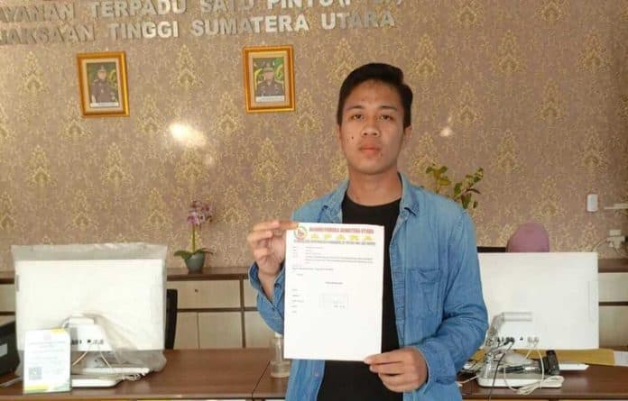 dilaporkan_pengadaan_kaos_marharoan_bolon_kadis_pmpn_simalungun_bungkam