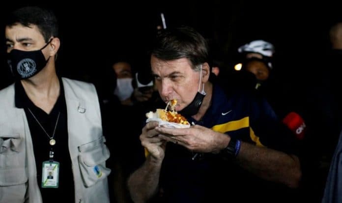 dipaksa_pakai_masker_presiden_brazil_ajukan_banding