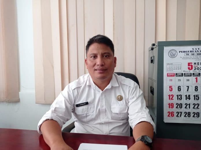 disdik_siantar_sebut_ujian_akhir_sd_smp_berjalan_lancar